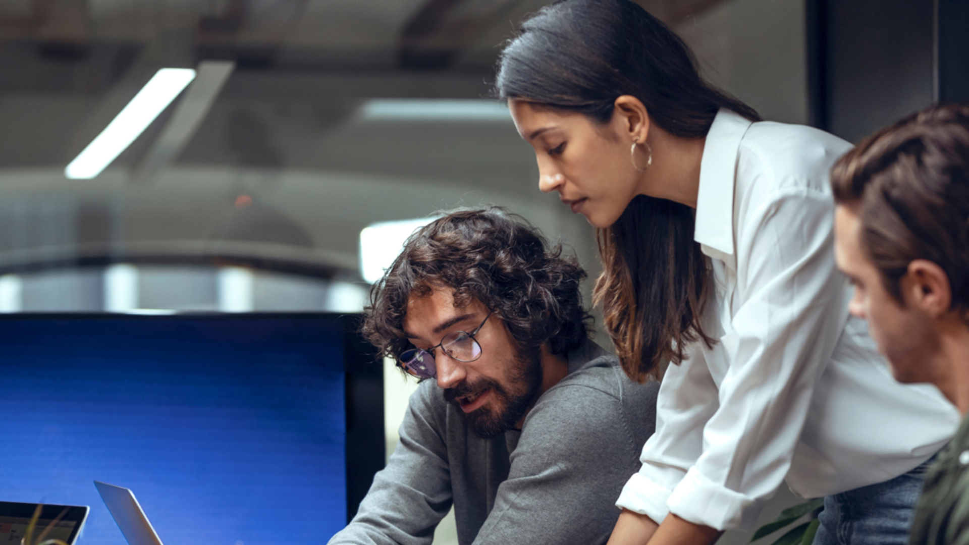 Team filling out an equality impact and needs assessment